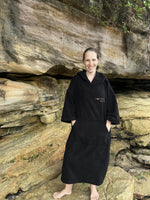 Vantura hooded changing poncho towel worn by woman