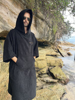 Vantura hooded changing poncho towel worn at the beach