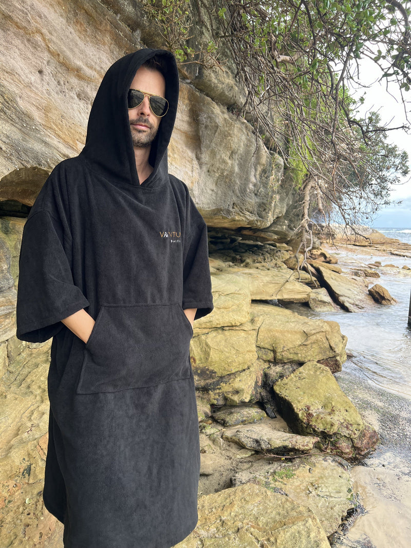 Vantura hooded changing poncho towel worn at the beach