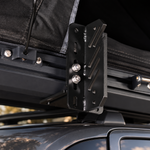 Vantura RTT L support bracket installed beneath a rooftop tent on a vehicle