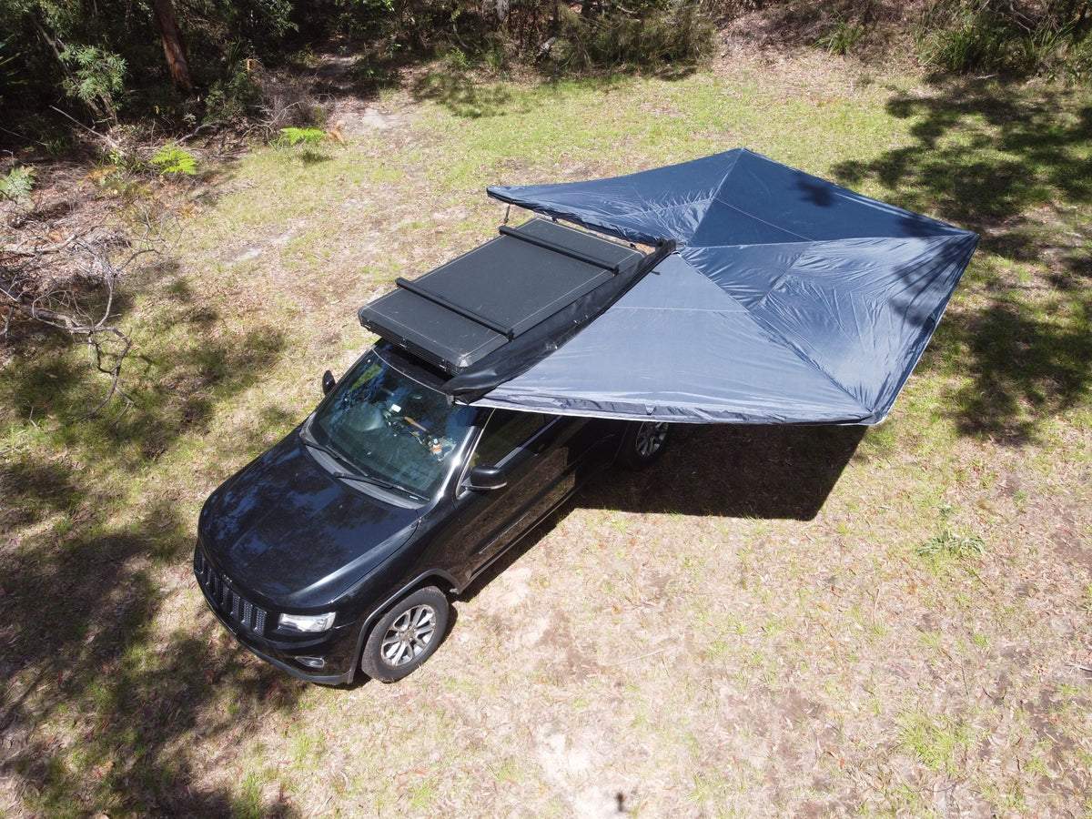 Elevated view of a Vantura awning and rooftop tent setup