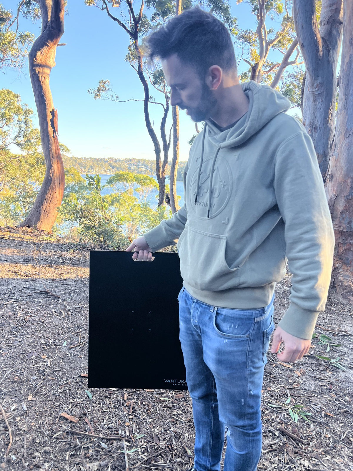 Carrying the folded metal Bootlid table