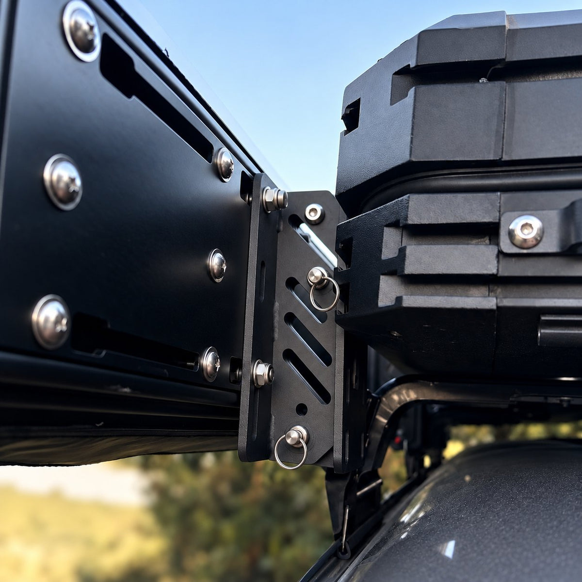Vantura quick-release awning brackets installed on a rooftop tent