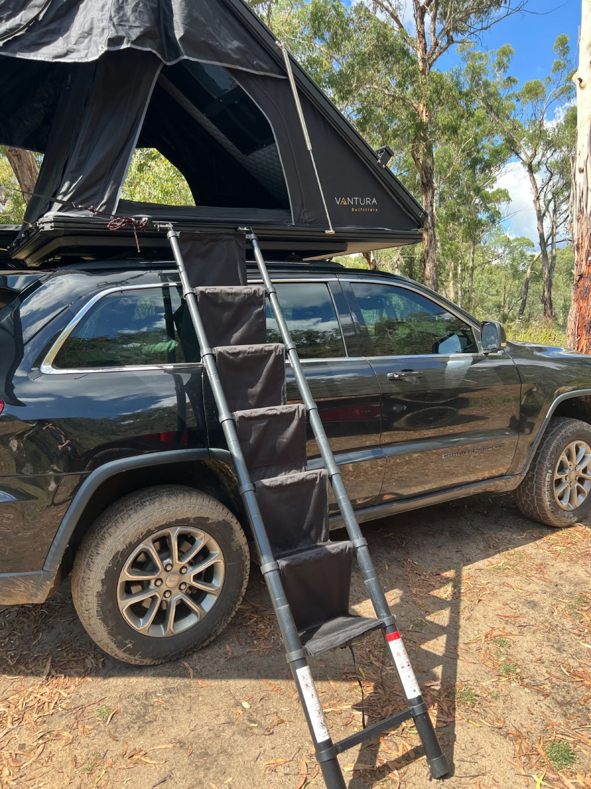 Rooftop tent ladder with padded Ladder Steps attached